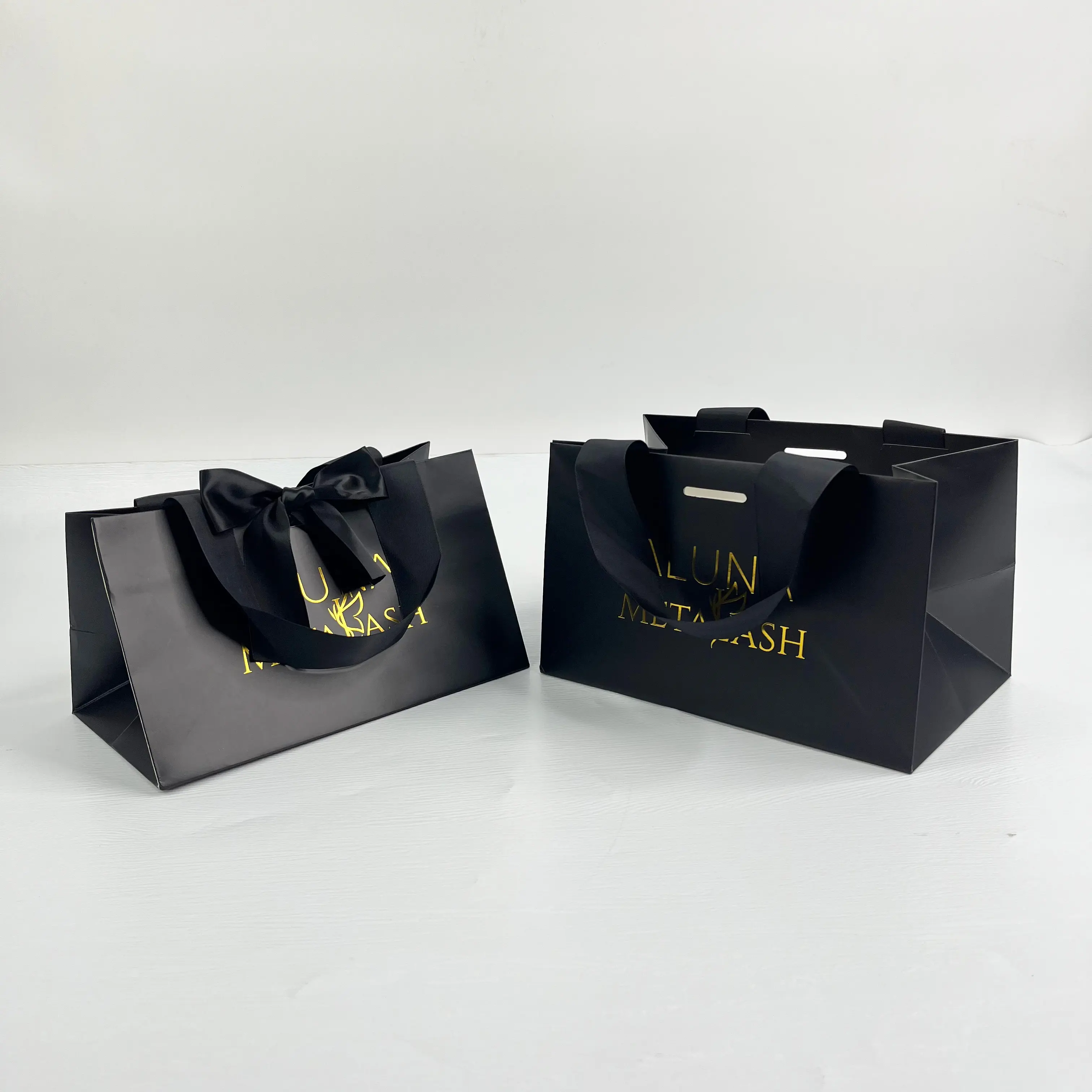 Custom luxury black paper bag with gold foil logo printed
