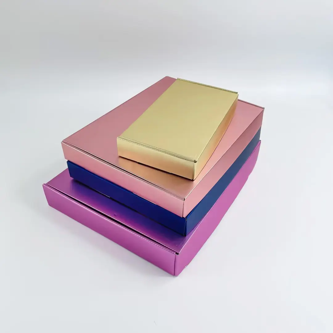 Peach paper mailer box with gold foil logo