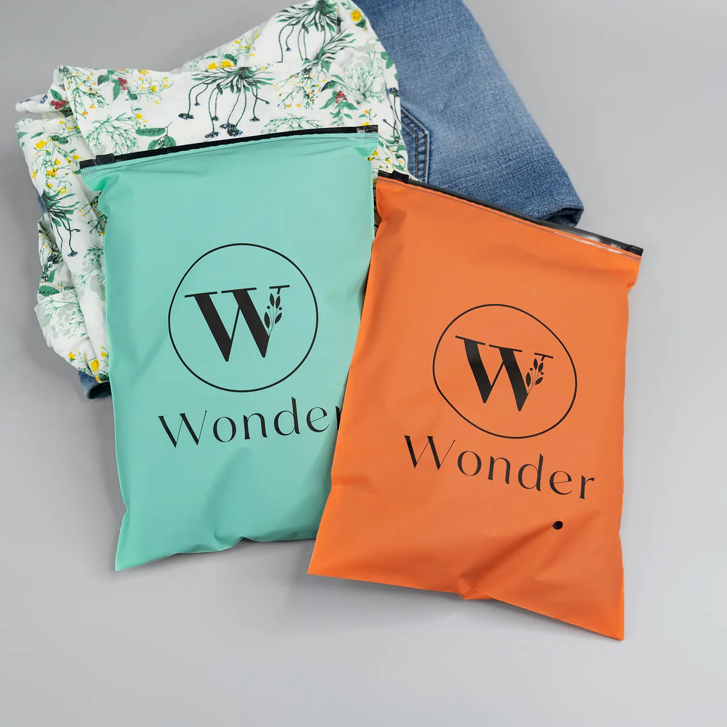 Wholesale custom clothing packaging zipper bag with logo