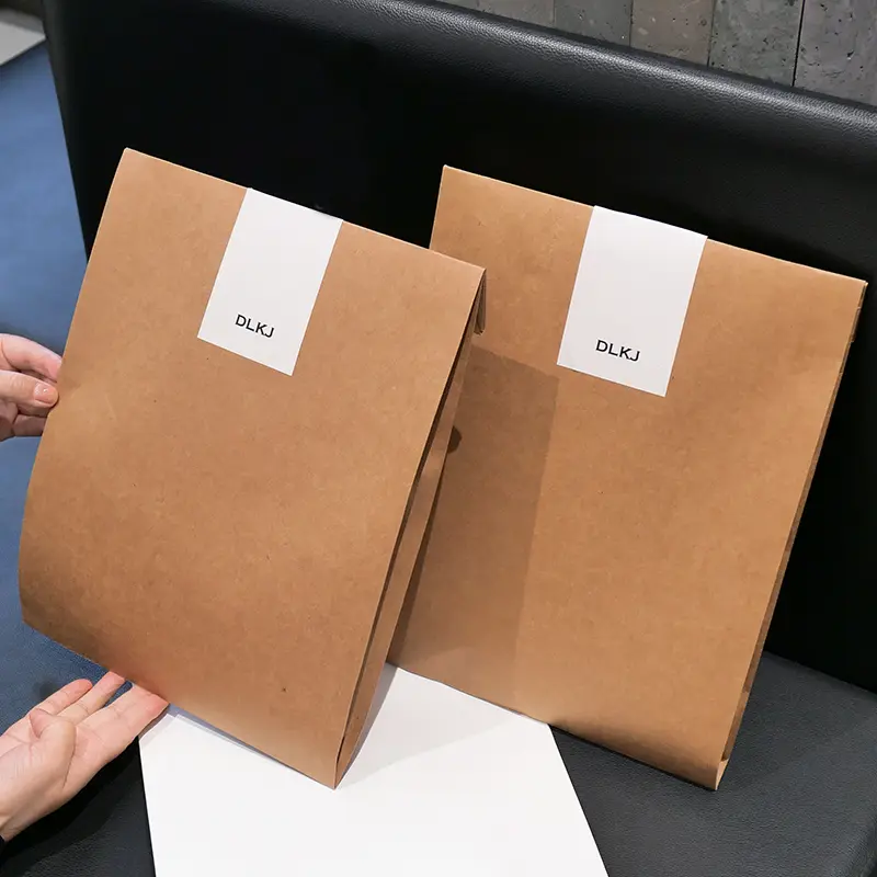 Custom logo brown kraft paper envelopes with self adhesive tape